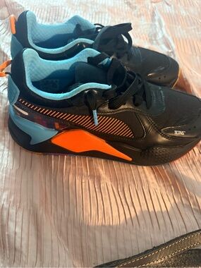 Puma Kids Black Sneakers with Bright Orange & Light Blue Accents